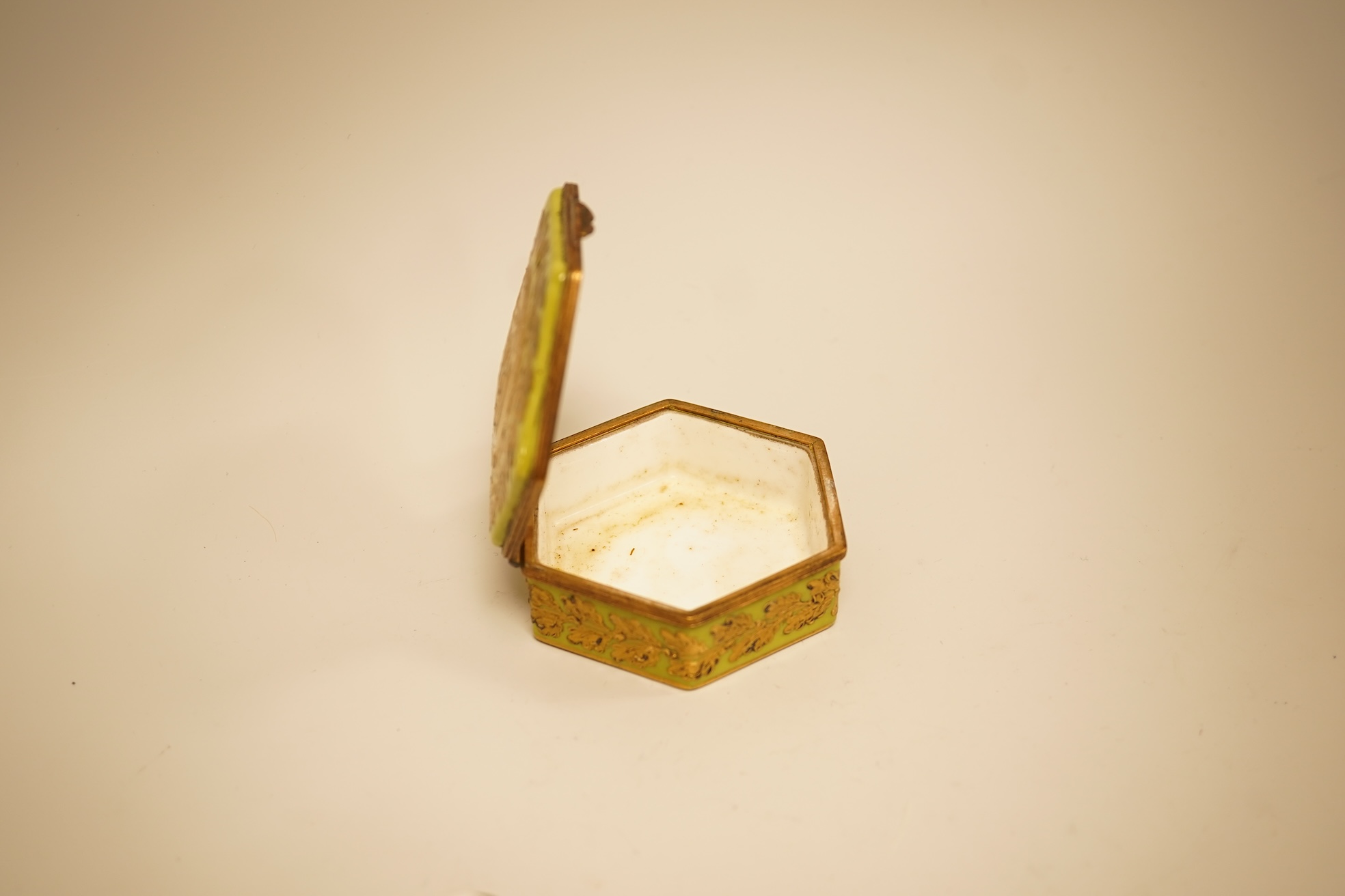 A Zsolnay lustre 'chicken' box and cover and two Sevres style porcelain boxes and covers (3) ‘chicken box’ 5cm diameter.
